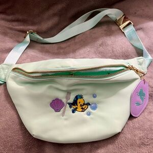 NWOT Fanny pack.  Never used.  This expands up to a 3X.  Great for parks.